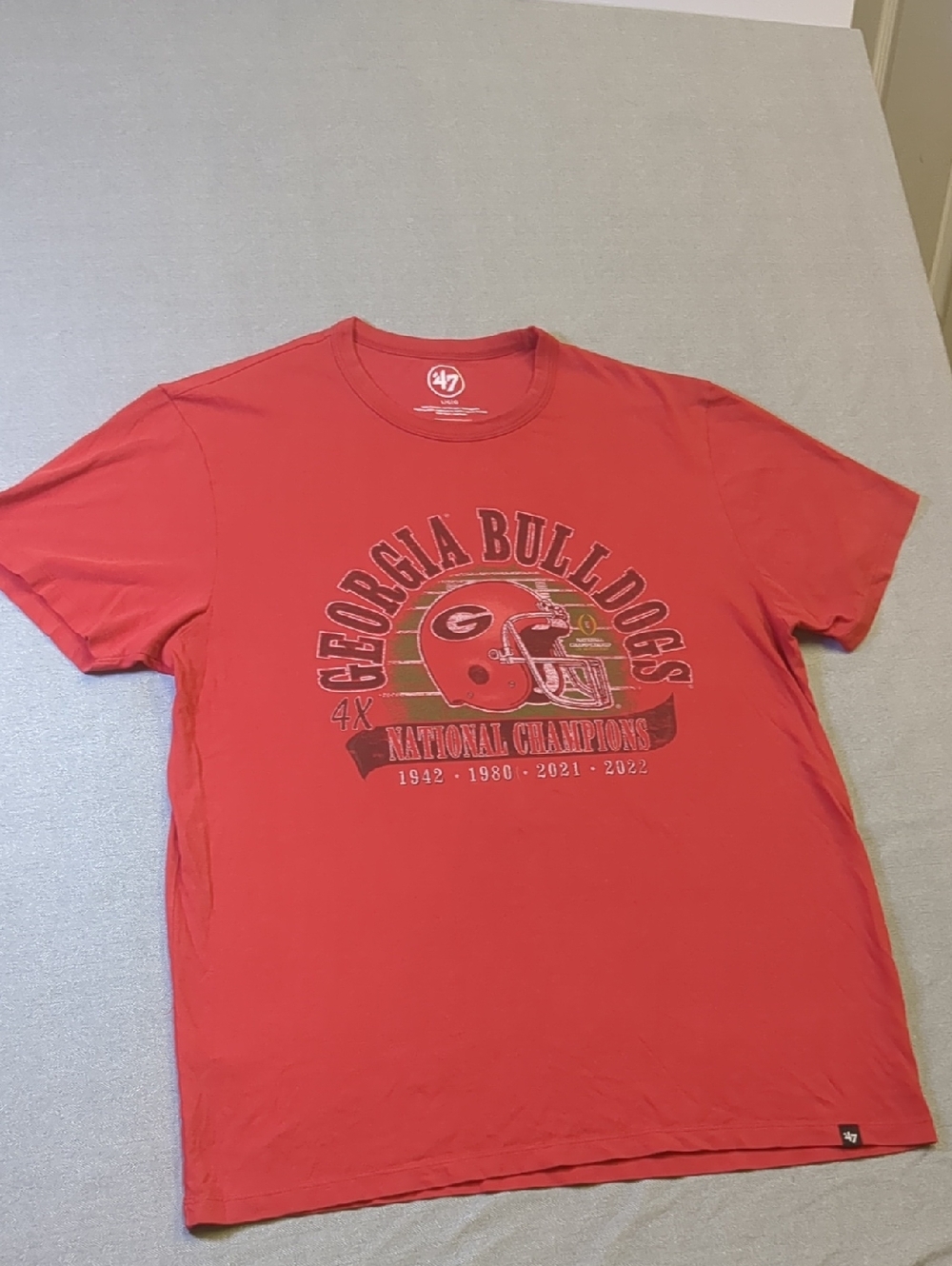 Title: Men's '47 Brand University of Georgia Bulldogs 4X National Champions Comm